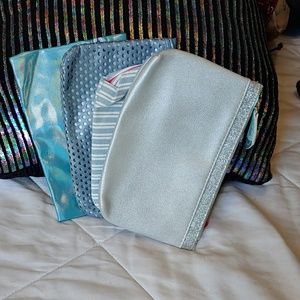 4 light blue Ipsy bags